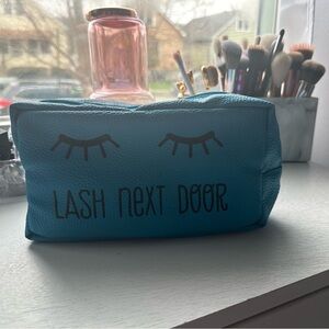 Blue lash next door makeup bag